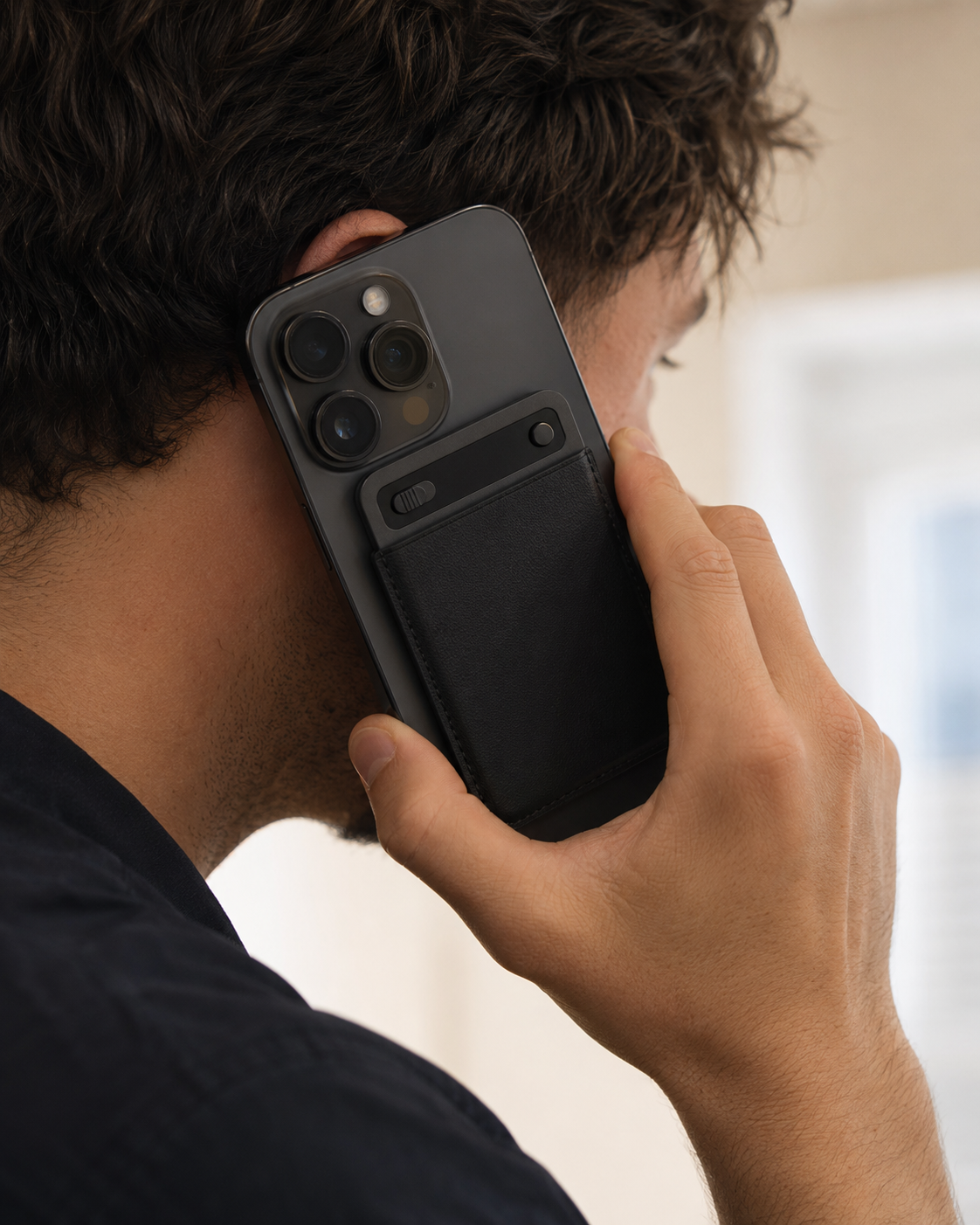 Meetwise Pro attached to a phone with MagSafe during a call